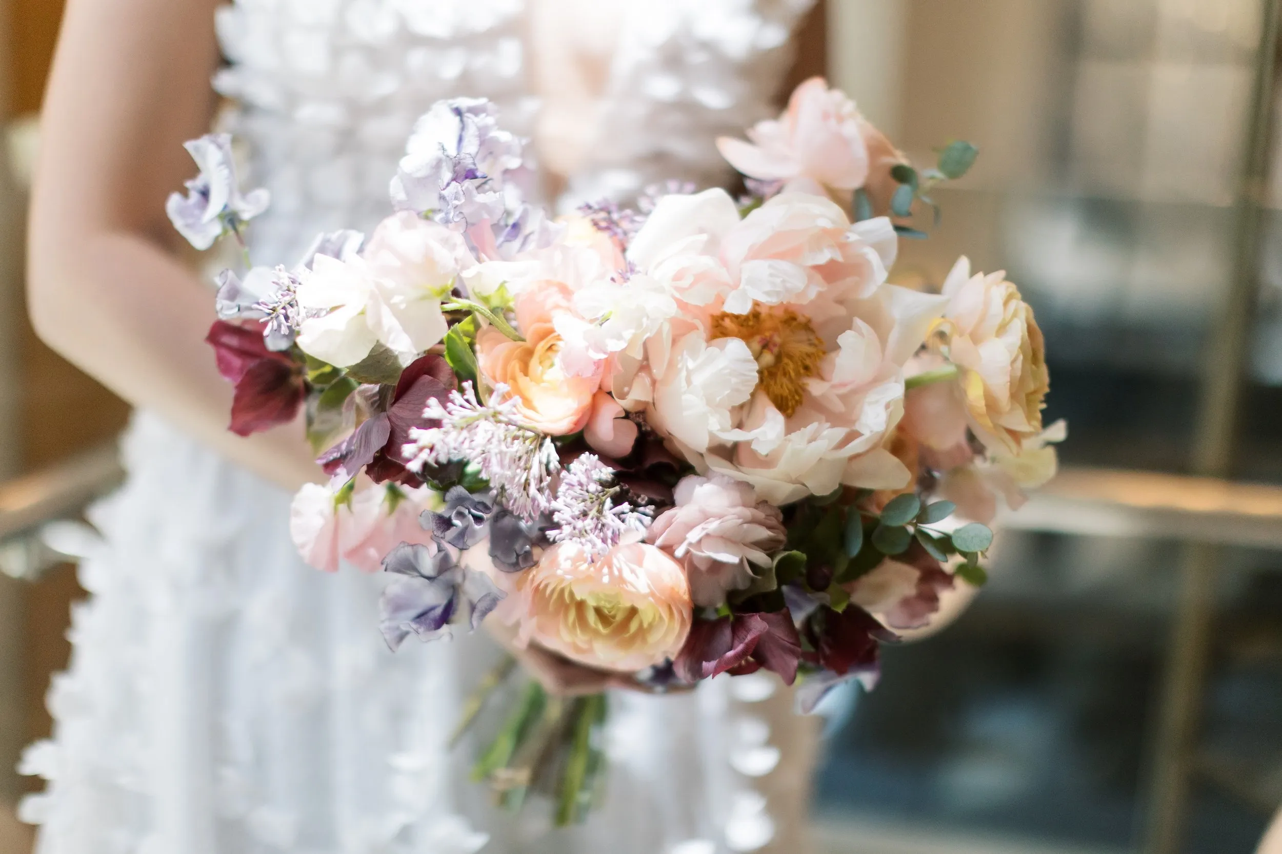 Elegant purple and peach Four Seasons wedding flowers, image 2