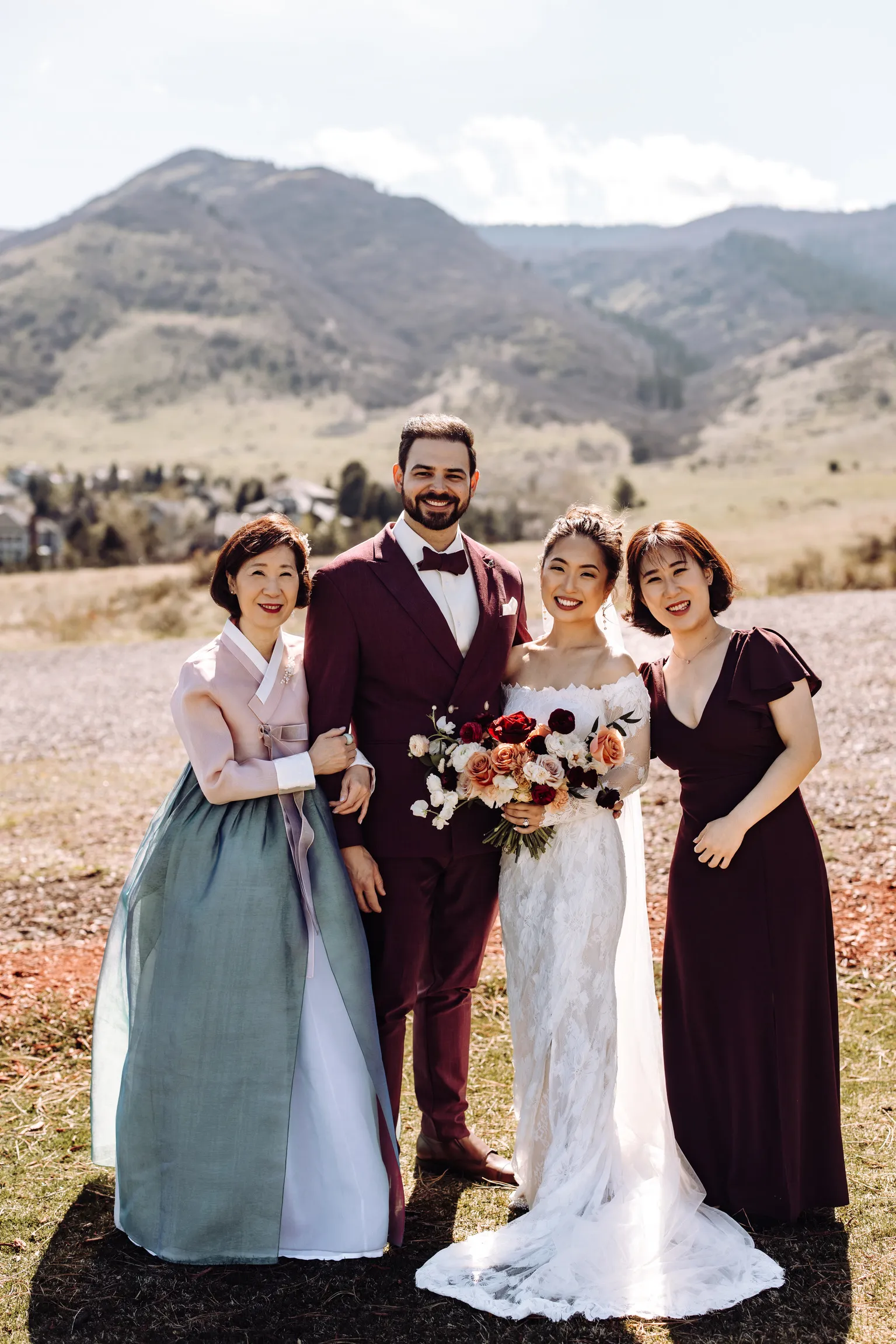 Wedding party with the Ken Caryl Valley foothills behind at The Manor House