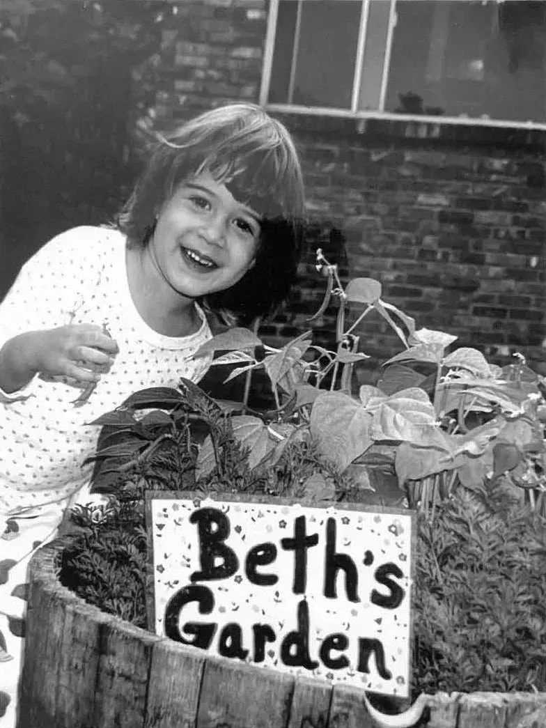 Elizabeth as a child in her garden